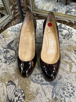 Load image into Gallery viewer, Louboutin Tortoise Pumps - Size 37
