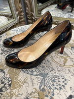 Load image into Gallery viewer, Louboutin Tortoise Pumps - Size 37
