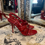 Load image into Gallery viewer, Gucci Patent Bow Tie star heels - 40C
